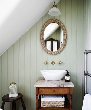 wooden sink stand in a cottage style bathroom with tongue & groove wall panelling