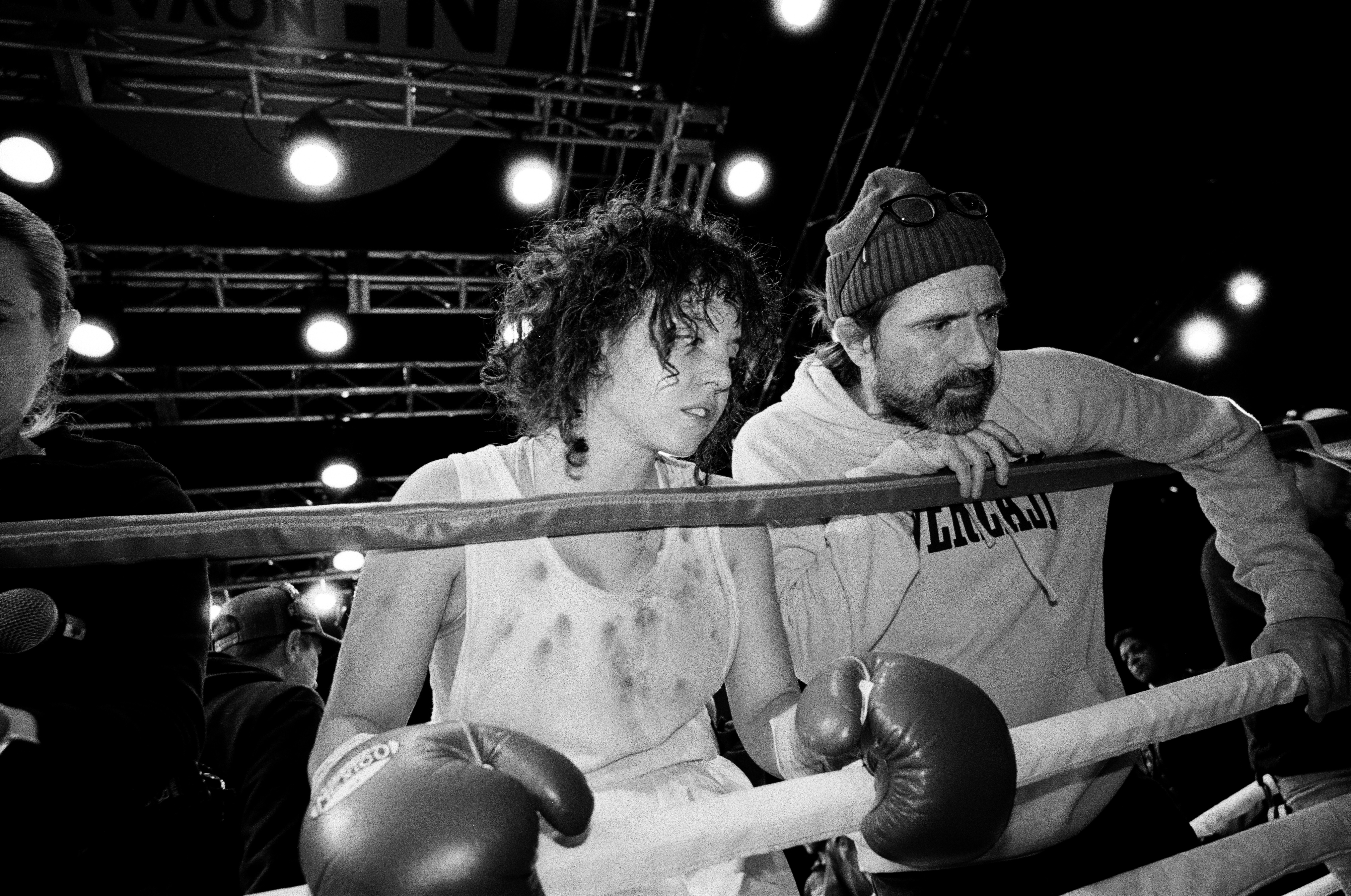 a black and white image of sweeney on set with Michod during filming