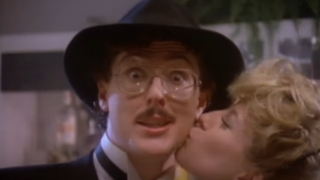Weird Al being kissed in music video for This Is The Life