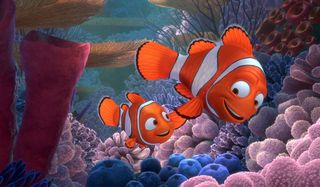 Finding Nemo Marlin and Nemo swim past some coral