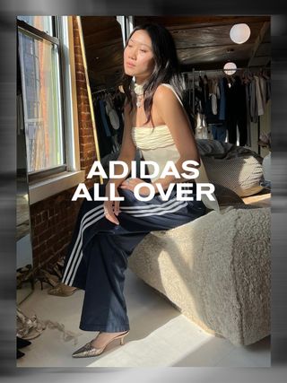 @vivian.yrl wearing cream tube top, Adidas track pants, and heels.