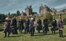 Best of Cruise 2025: line up of women wearing tartan at Dior show with Drummond Castle in the background