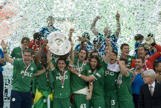 Wolfsburg players celebrate winning the Bundesliga title after a 5-1 win over Werder Bremen in May 2009.