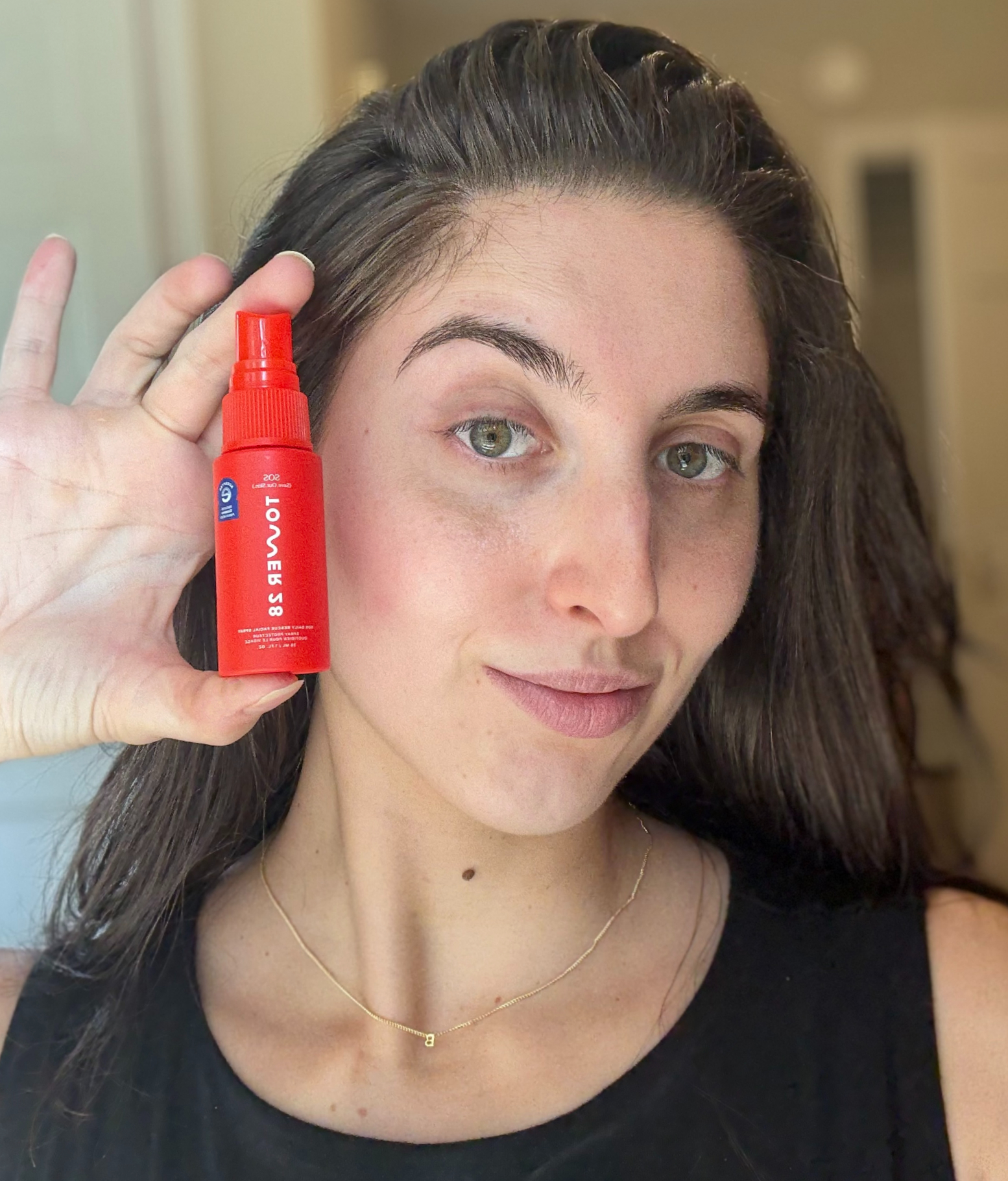 Marisa Petrarca using Tower 28 SOS Spray