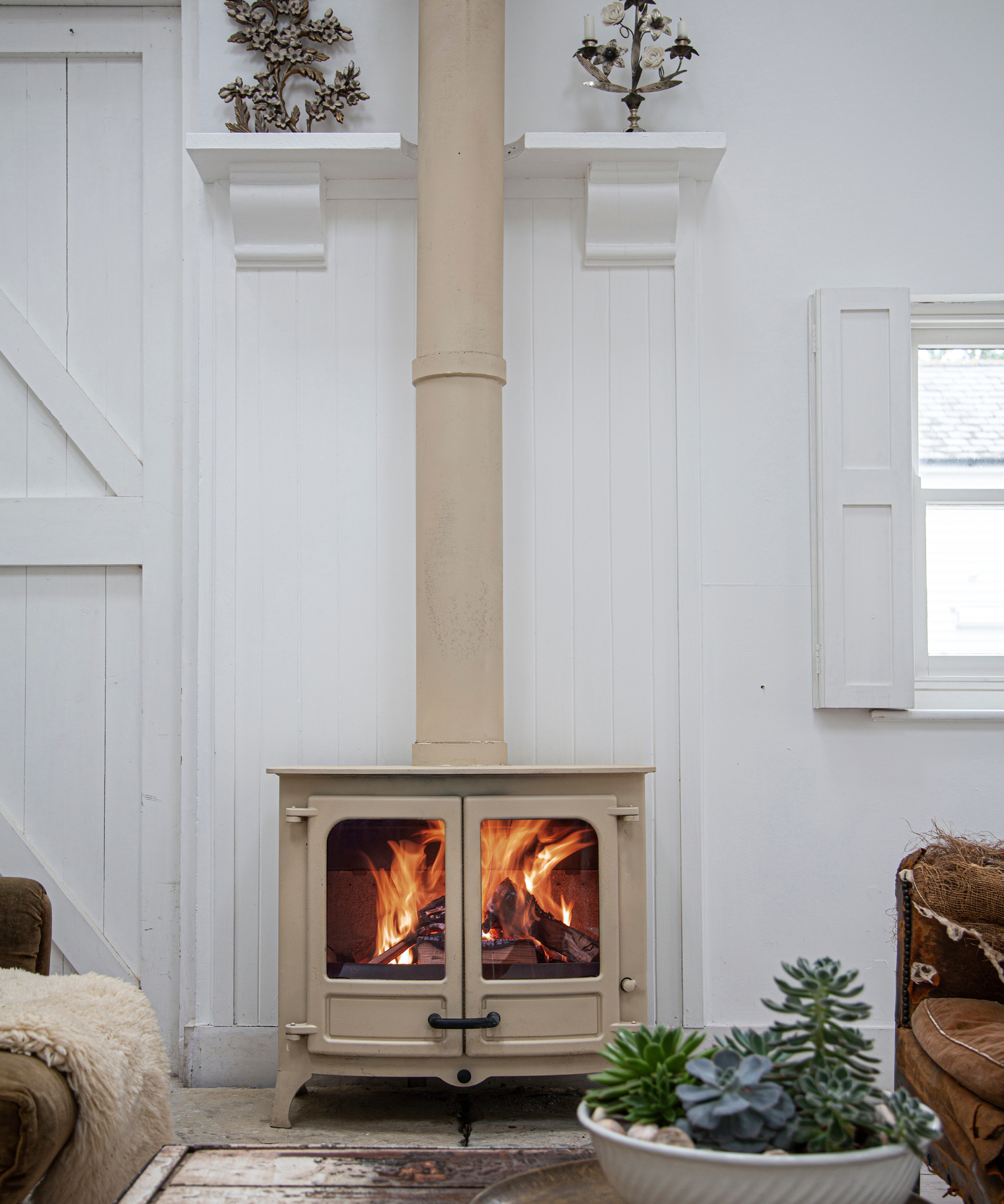 cream log burner with large cream flue