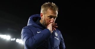 Chelsea manager Graham Potter looks dejected following the team's defeat in the Premier League match between Fulham FC and Chelsea FC at Craven Cottage on January 12, 2023 in London, England