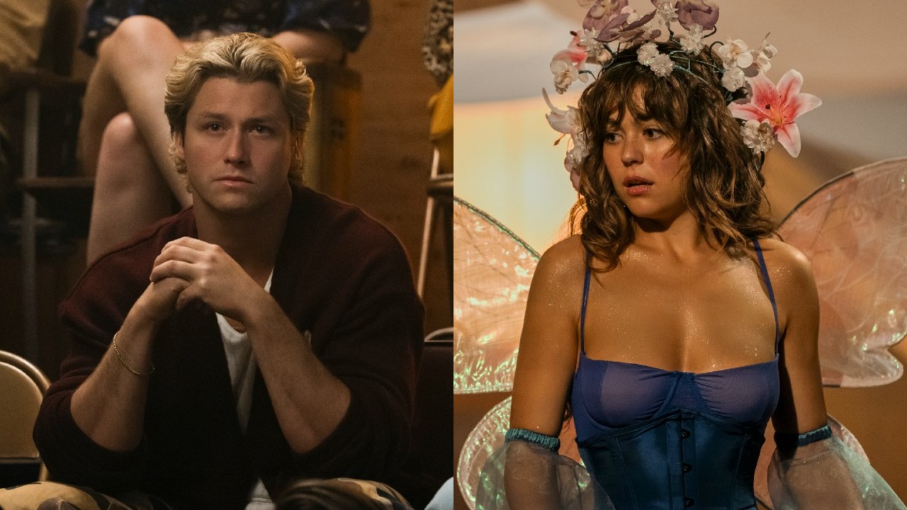 From left to right: Dean watching theater with his elbows resting on his legs, he's leaning forward, and Allie dressed as a fairy looking shocked. 