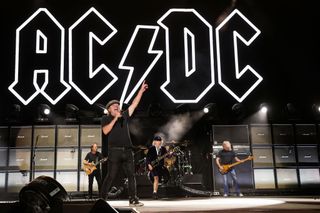 Stevie Young, Brian Johnson, Angus Young, and Cliff Williams of AC/DC perform onstage during the Power Trip music festival at Empire Polo Club on October 07, 2023 in Indio, California. (Photo by Kevin Mazur/Getty Images for Power Trip)