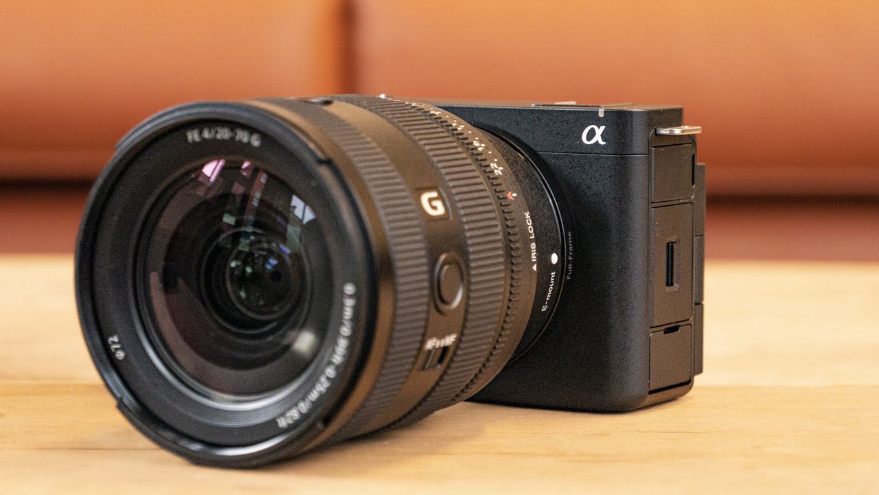 The Sony ZV-E1 camera sitting on a wooden table