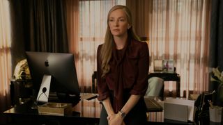 Katherine Newman looks somber as she stands in her office in Suspicion