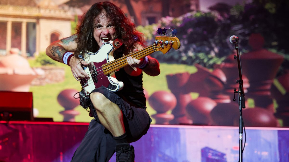 Steve Harris onstage with Iron Maiden in 2023