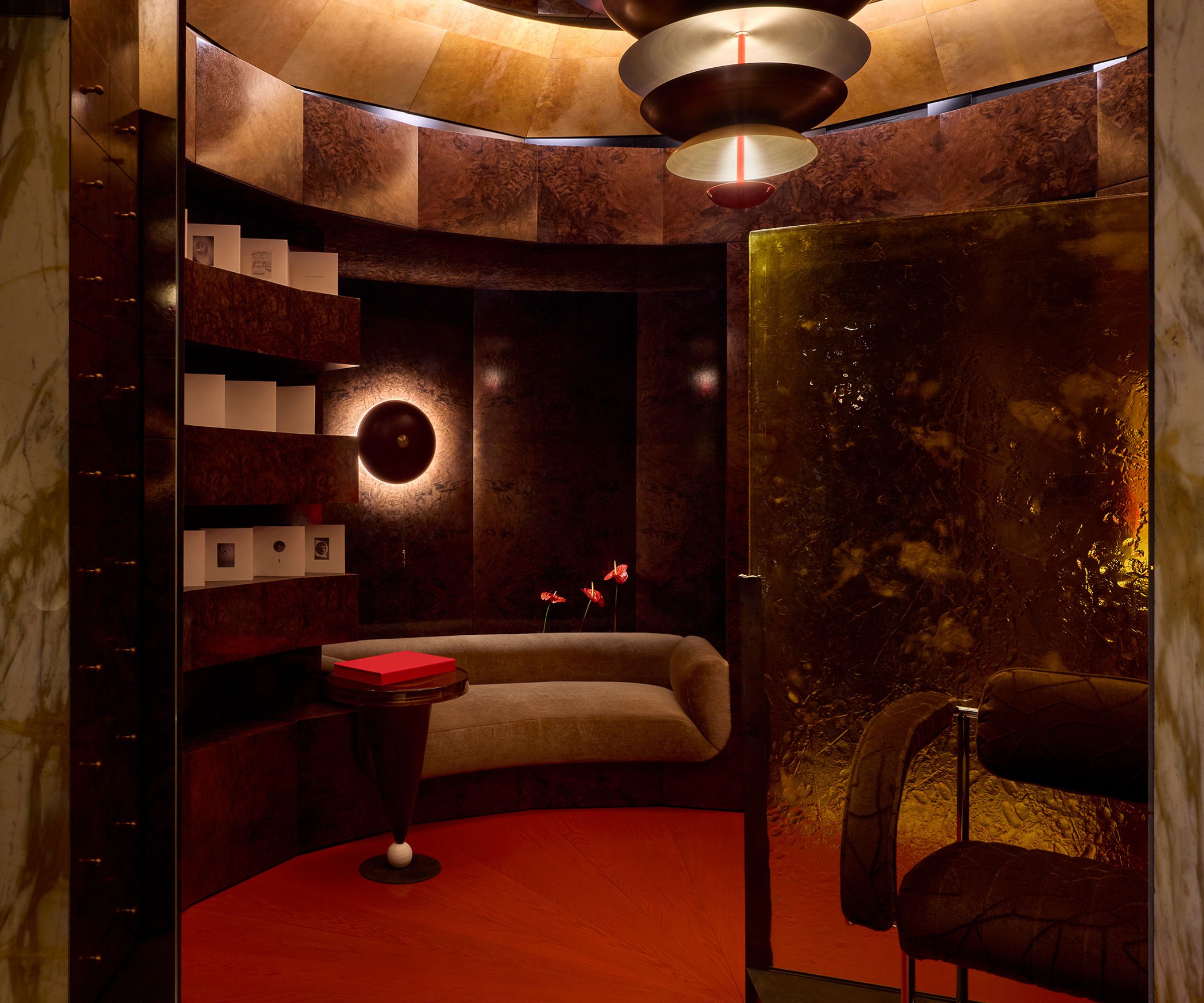 a moody metallic library space designed by Roisin Lafferty for WOW!House 2026