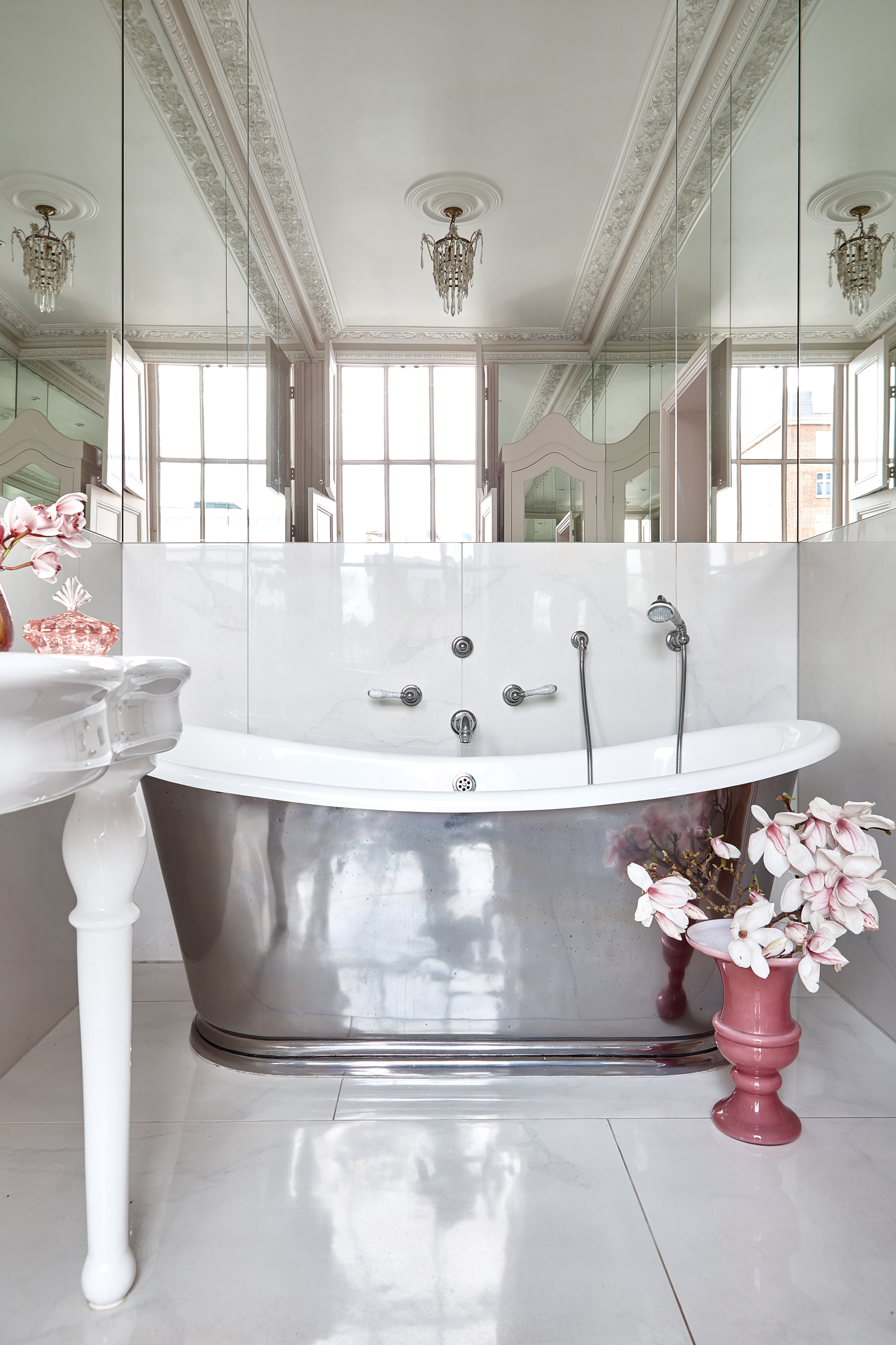 elegant en suite bathroom in Georgian home with cast-iron bath polished finish