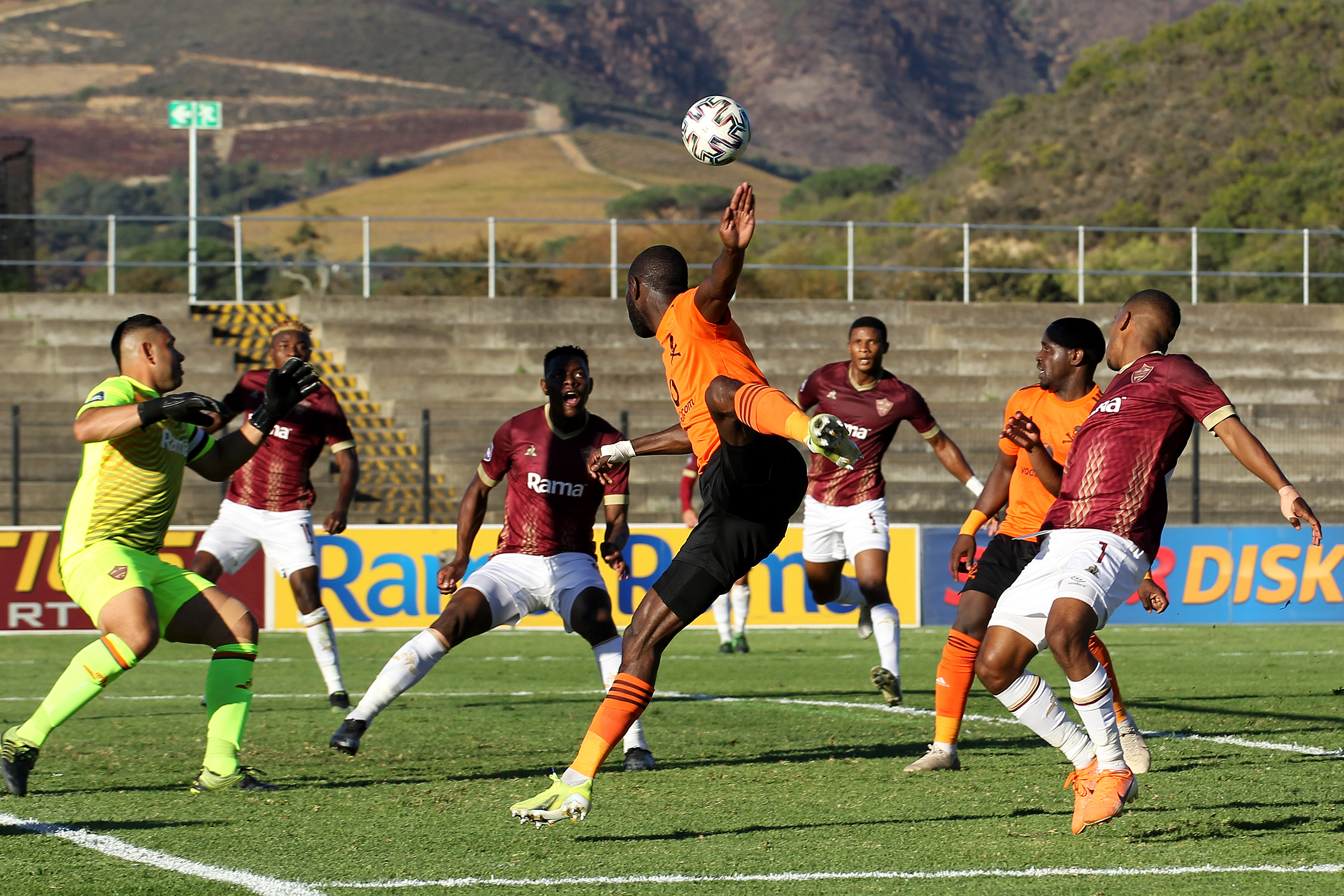 Deon Hotto of Orlando Pirates heads the ball into the area