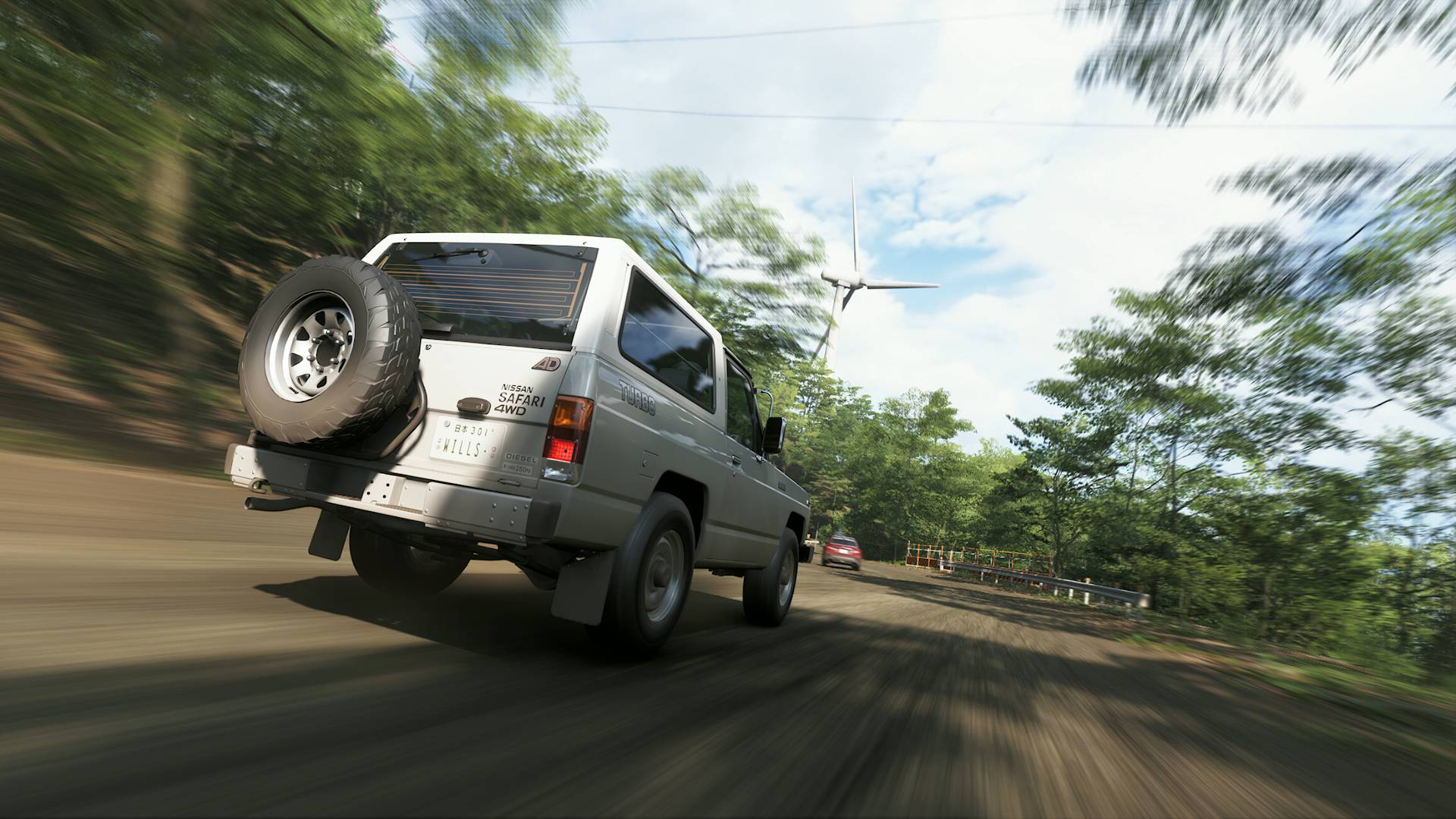 Forza Horizon 6 nissan safari turbo Treasure Car driving down dirt road near wind turbines