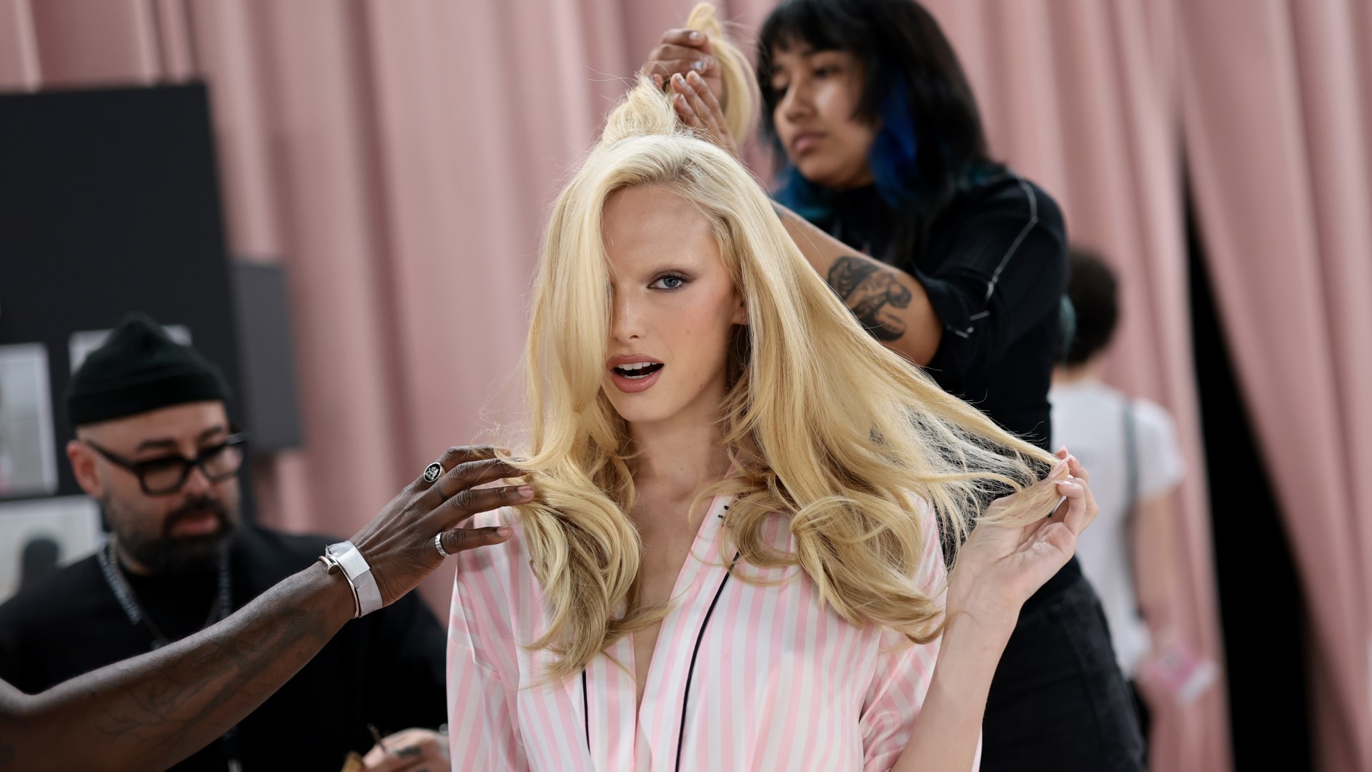 Alex Consani prepares backstage at the Victoria's Secret Fashion Show 2025 on October 15, 2025 in New York City.