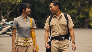 Two workers smile at each other in The White Lotus season 3