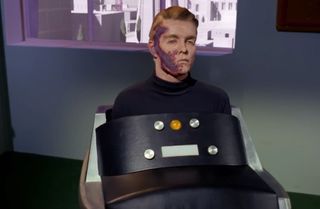 Captain Pike, played by Sean Kenney for the "Star Trek: The Original Series" episode "The Menagerie" has been paralyzed by delta ray radiation in a training accident