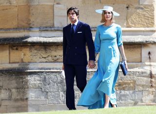 Argentinian model and photographer Delfina Blaquier (R) and her husband Nacho Figueras arrive for the wedding ceremony of Britain's Prince Harry, Duke of Sussex and US actress Meghan Markle at St George's Chapel, Windsor Castle, in Windsor, on May 19, 2018.