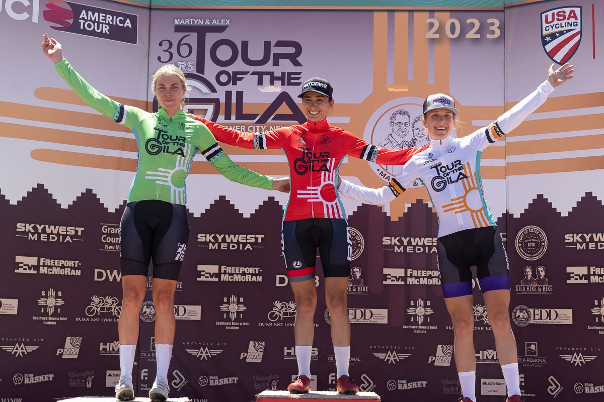 Women's classification jerseys (red also wearing polka dots)