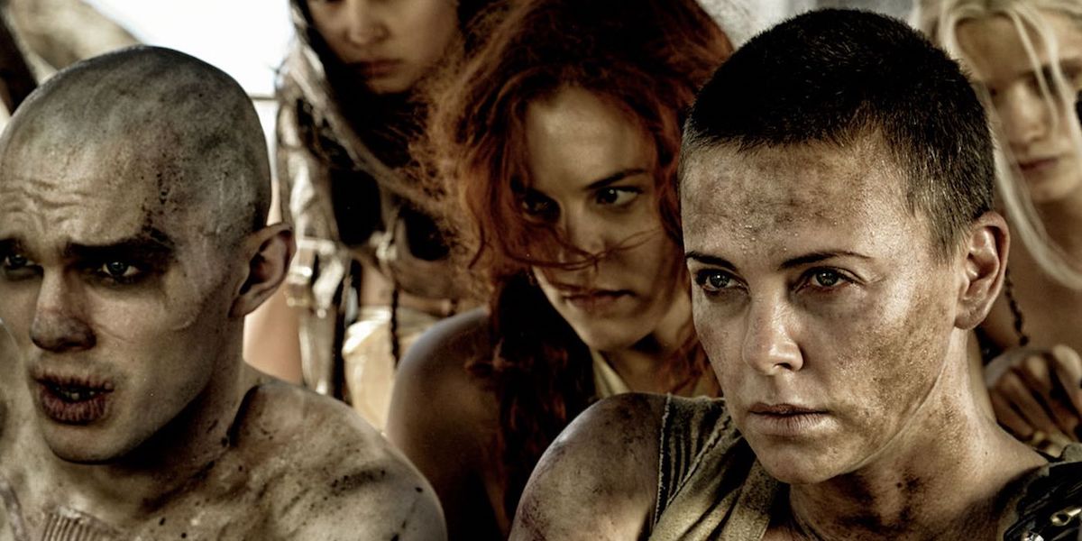 Imperator Furiosa (Charlize Theron) drives Nux, Capable and The Splendid Angharad in Mad Max: Fury Road