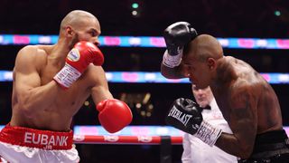 Conor Benn shielding from Chris Eubank Jr