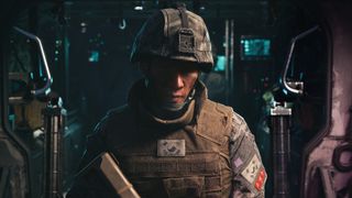 A weary soldier in helmet and body armor stands in a dim, high-tech vehicle interior, his lowered gaze and tense posture conveying fatigue and unease.