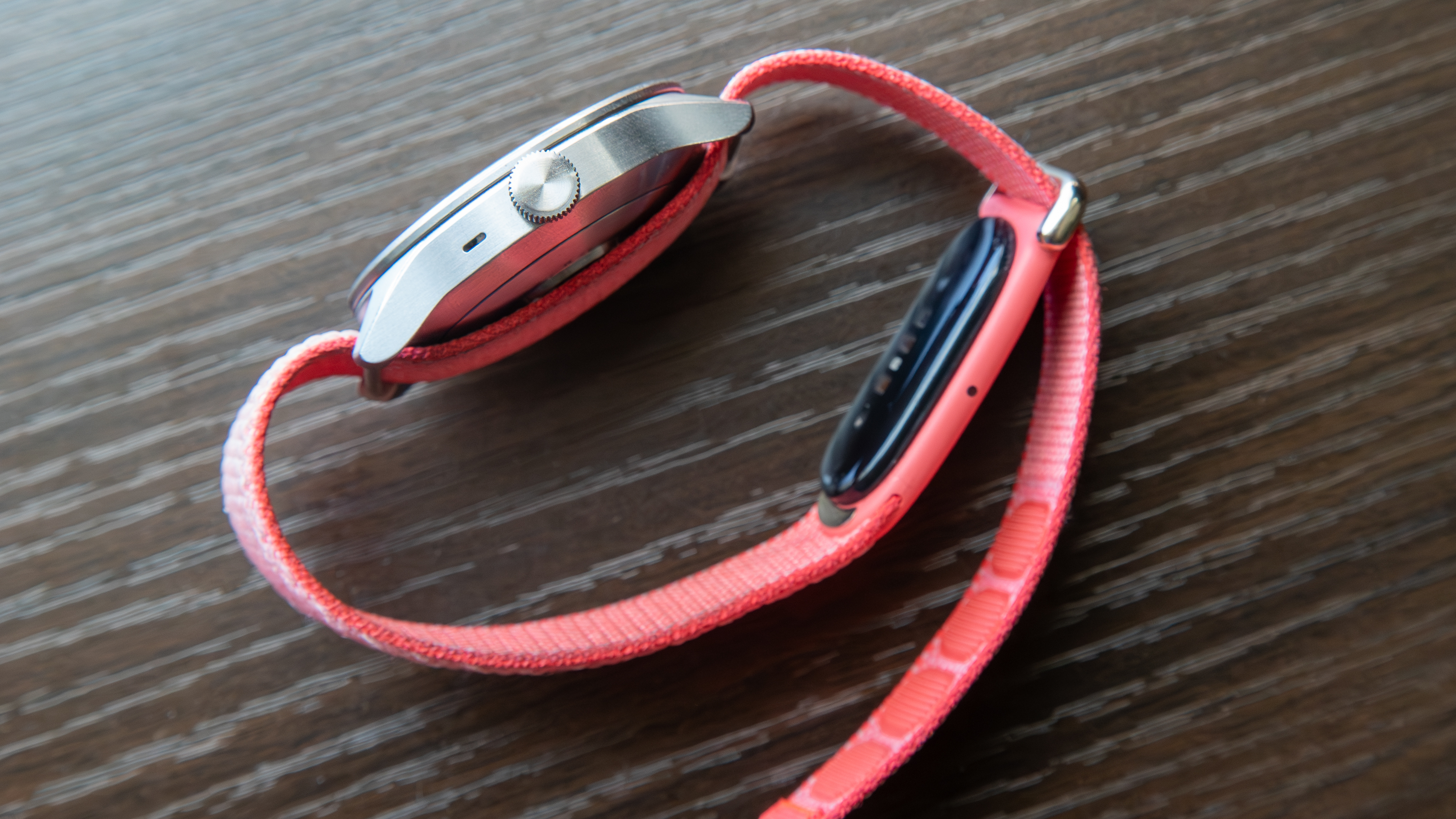 Google Fitbit Air band with an analogue watch