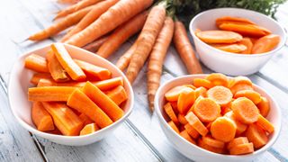 bowl of chopped carrot sticks