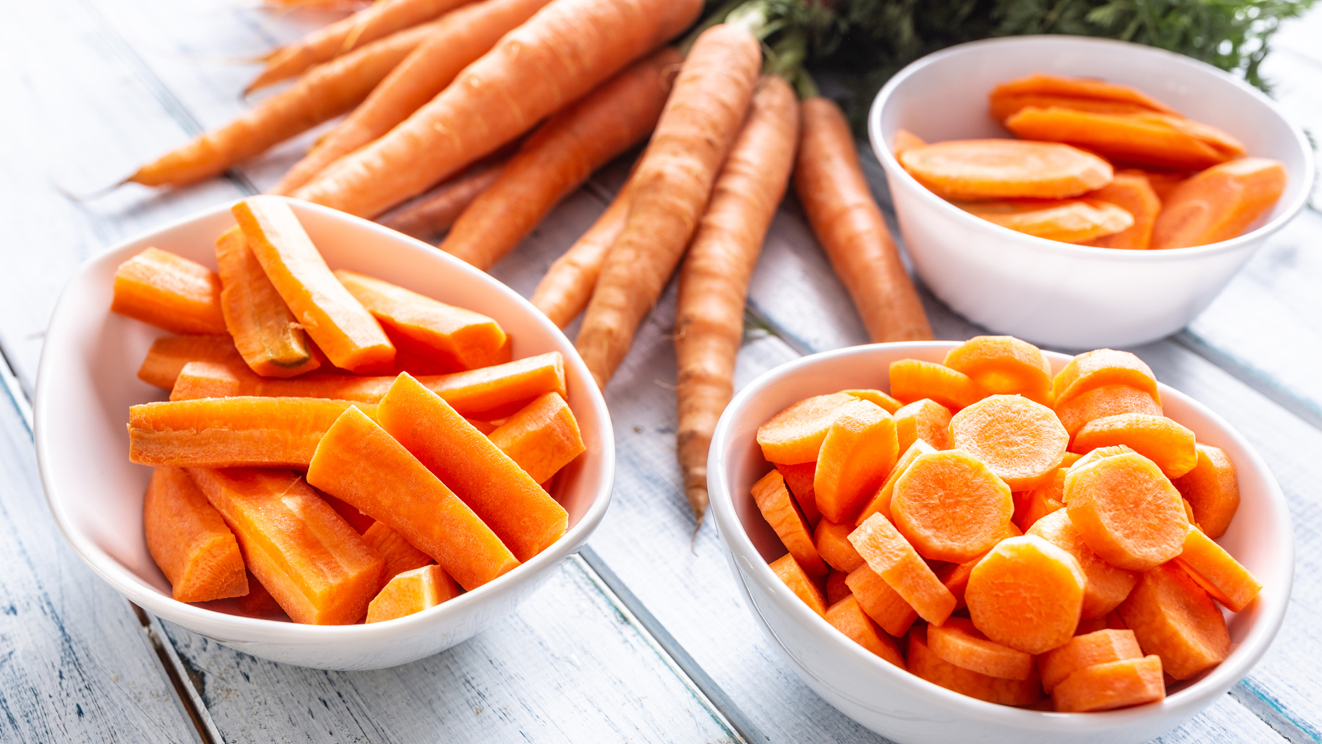 bowl of chopped carrot sticks