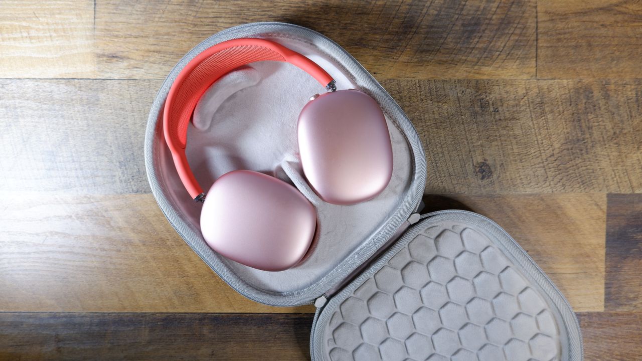 Smart Case for AirPods Max in gray showing case internals and holding pink AirPods Max