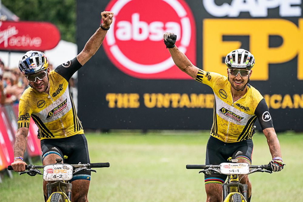Lars Forster and Nino Schurter of Scott-SRAM MTB-Racing celebrate winning stage 1 of the 2019 Absa Cape Epic Mountain Bike stage race