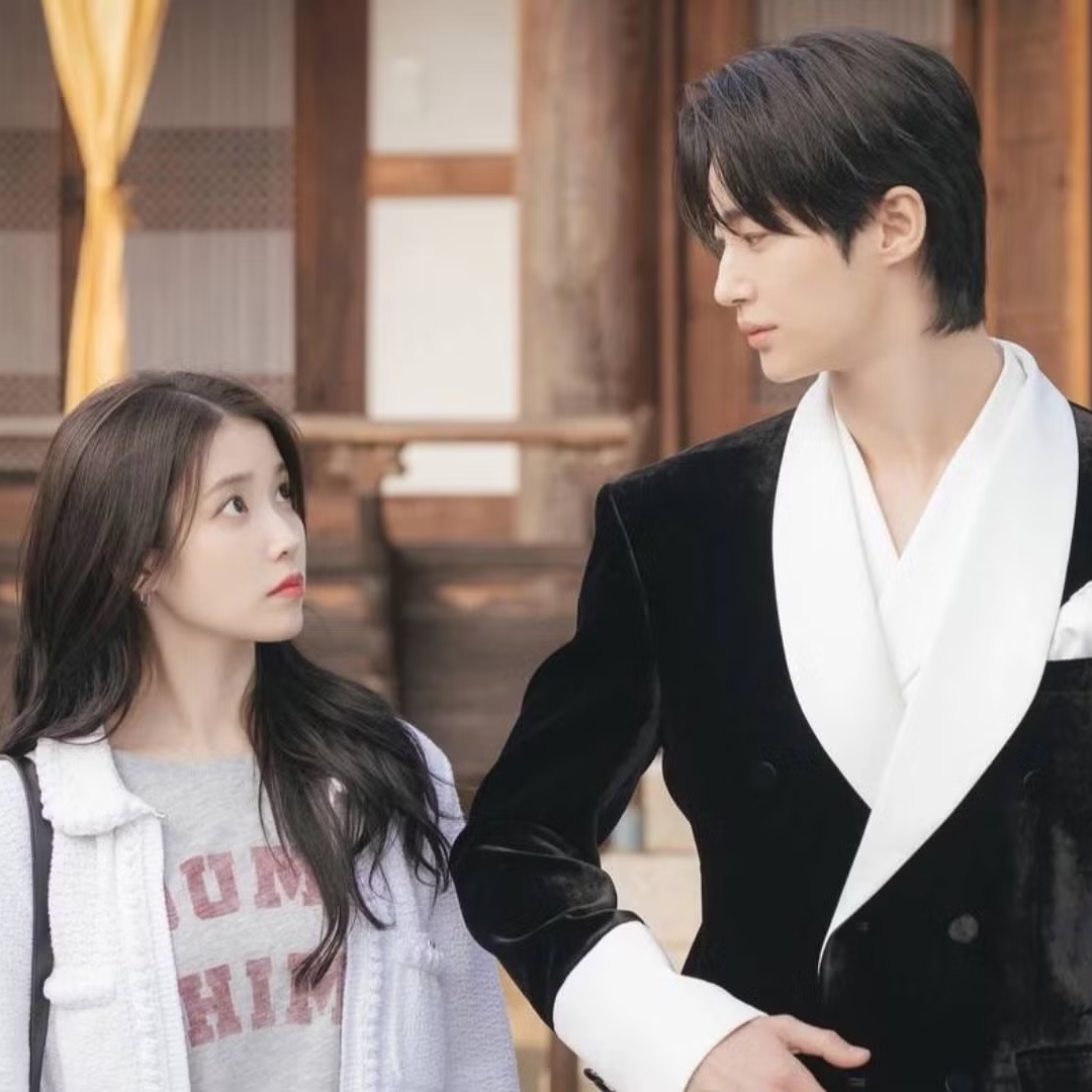 IU as Seong Hui-ju and Byeon Woo-seok as Crown Prince I-AN in 'Perfect Crown.'
