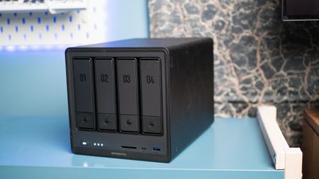 UGREEN DXP4800 Pro 4-bay NAS on a side table