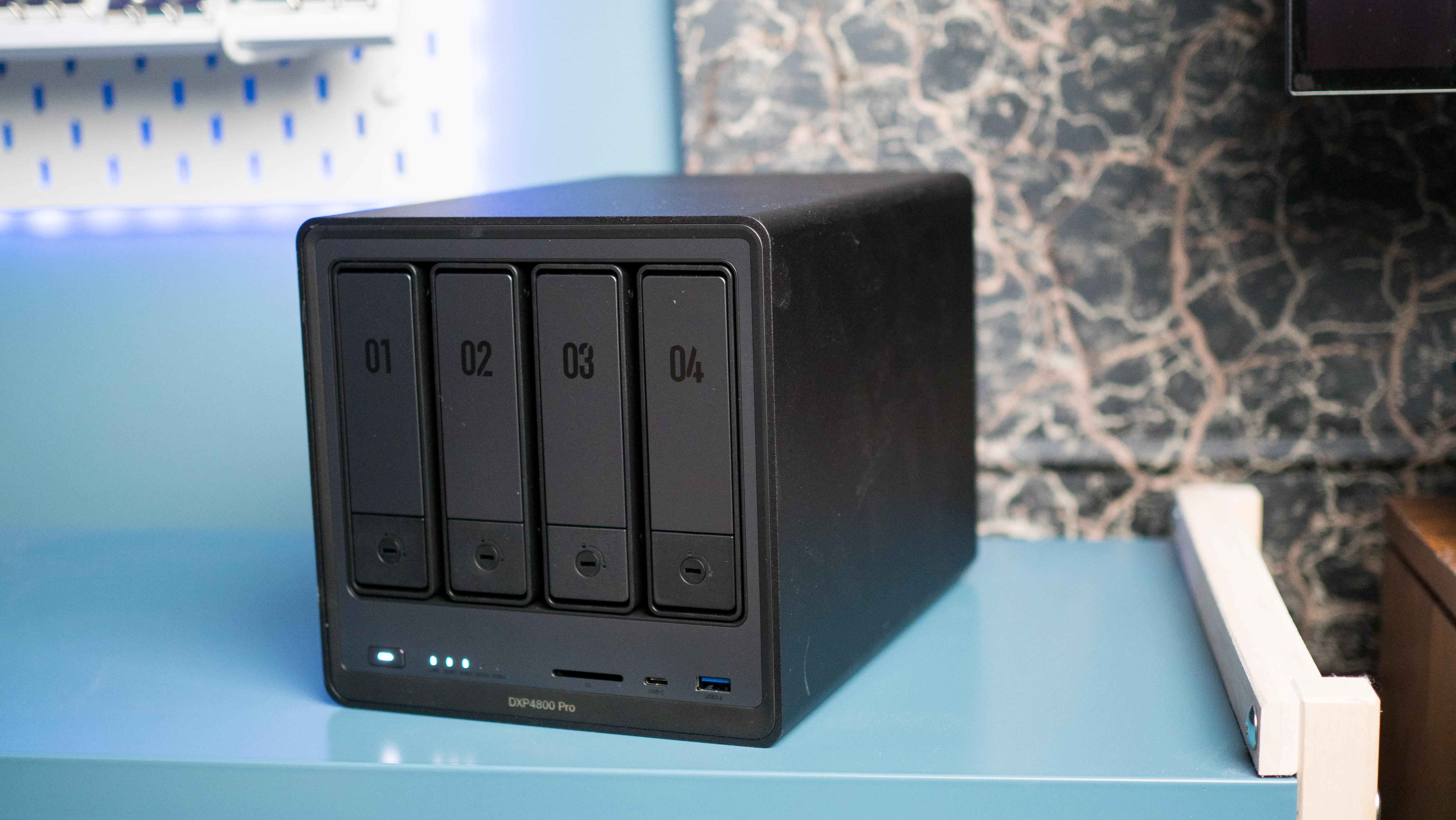 UGREEN DXP4800 Pro 4-bay NAS on a side table