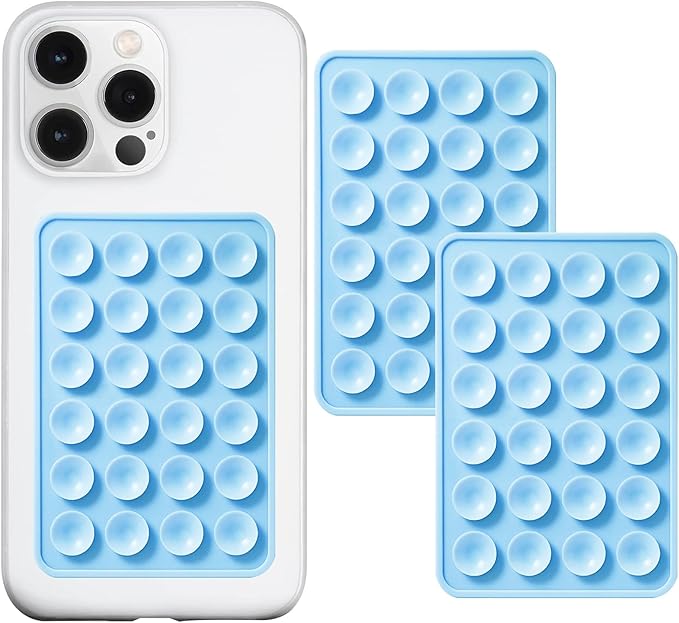 A baby blue sticky phone grip on the back of a white iPhone