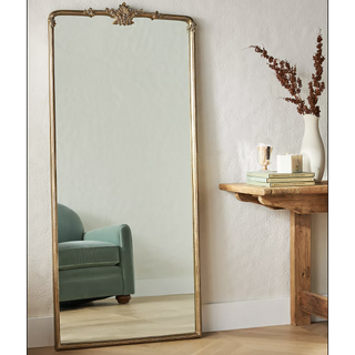 An ornate rectangular mirror