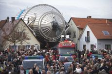 The KATRIN experiment's giant spectrometer passed through Eggenstein-Leopoldshafen, Germany in 2006 on its way to the nearby Karlsruhe Institute of Technology.