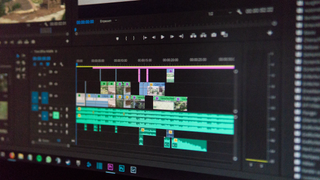 Close-up of a monitor running video editing software Adobe Premiere Pro