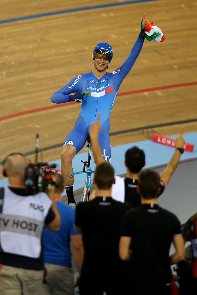 Filippo Ganna of Italy celebrates after winning The Men's Individual Pursuit