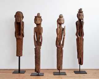Hand - carved wooden mourning figures. Jorai people. Late 19th to early 20th century