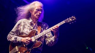 Steve Howe performs on stage with Yes on August 18, 2014 in San Diego, California