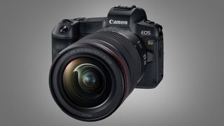 The Canon EOS Ra camera on a grey background