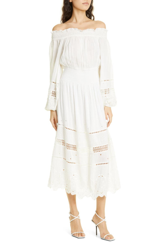 white linen dress with lace cutouts
