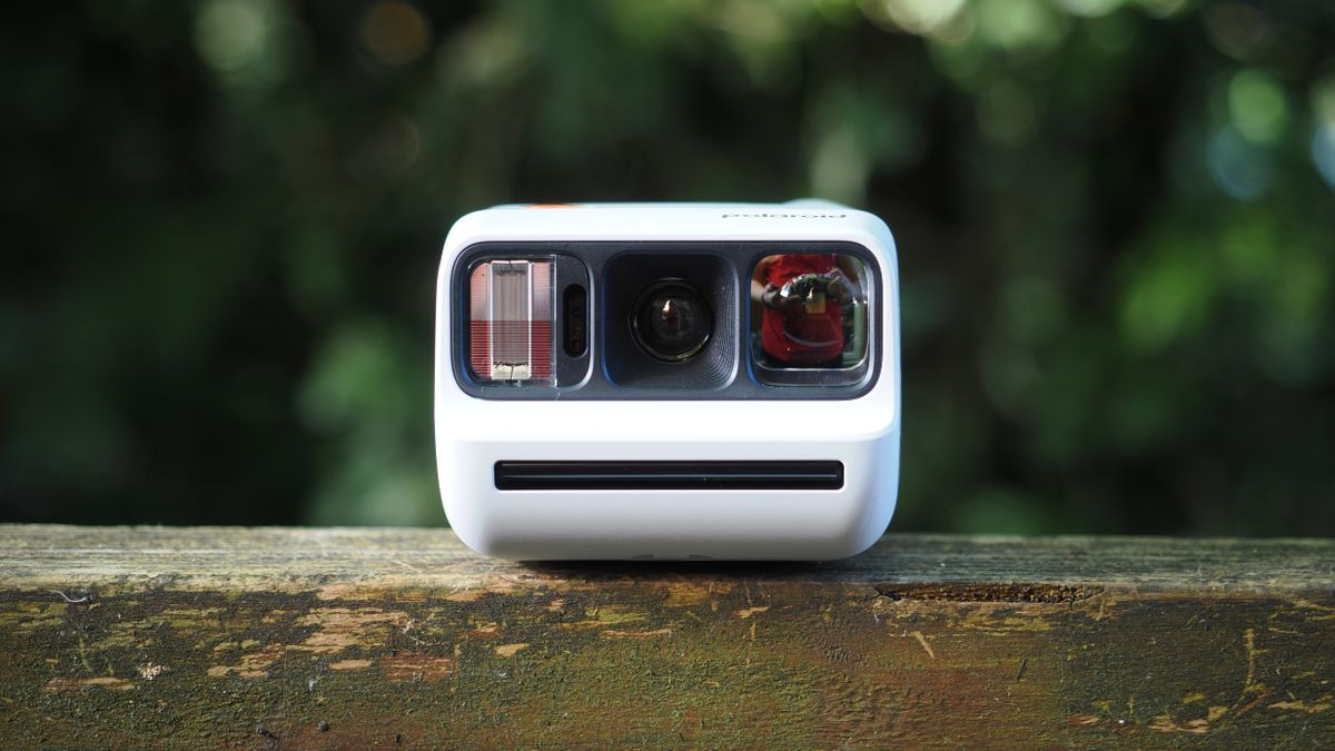 Polaroid Go Gen 3 on a wooden surface outdoors