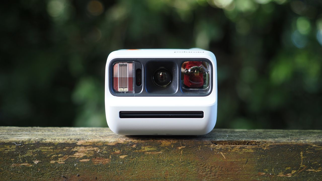 Polaroid Go Gen 3 on a wooden surface outdoors