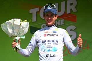 LEVICO TERME ITALY APRIL 19 Antonio Tiberi of Italy and Team Bahrain Victorious celebrates at podium as White Best Young Rider Jersey winner during the 47th Tour of the Alps 2024 Stage 5 a 1186km stage from Levico Terme to Levico Terme on April 19 2024 in Levico Terme Italy Photo by Tim de WaeleGetty Images