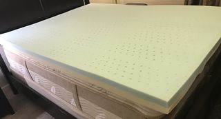 Casper Comfy Mattress Topper on a Saatva Loom and Leaf mattress, without the knit cover