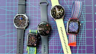 A close-up of the best smartwatches in 2026, showing the Samsung Galaxy Watch 8, Apple Watch SE 3, Google Pixel Watch 4, Garmin Venu 4, and Apple Watch Series 11