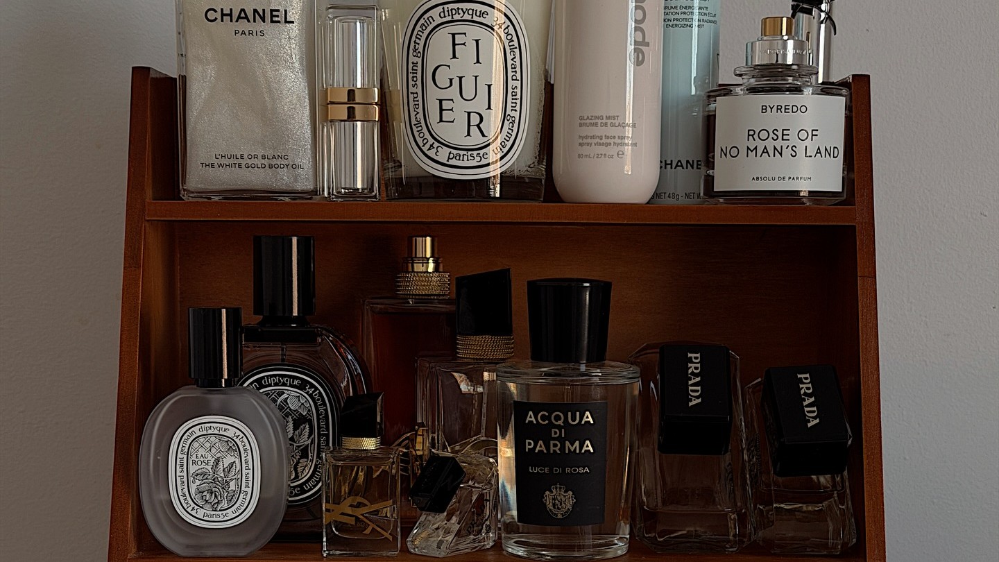 Photo of perfumes and skincare products on a vanity